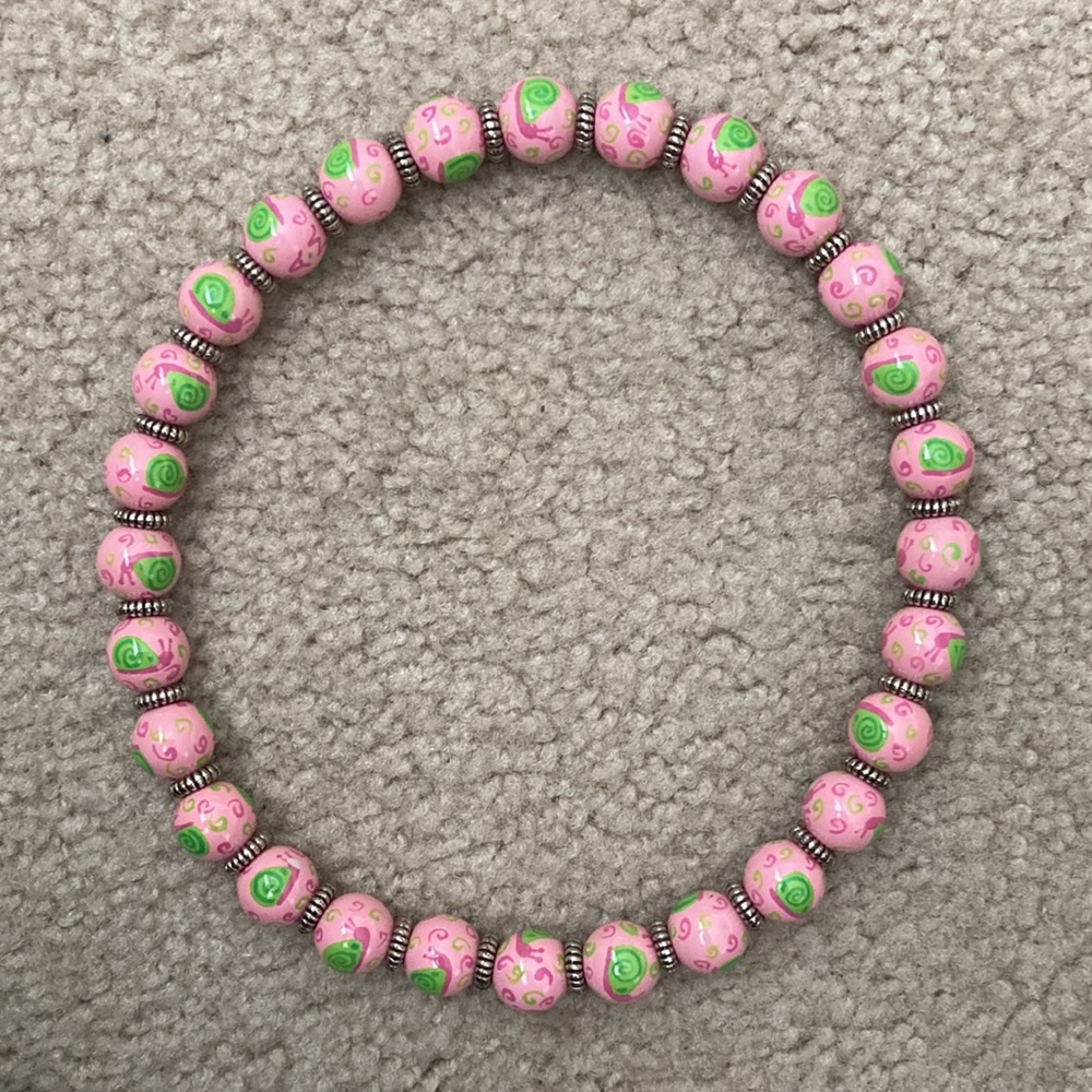 Angela Moore necklace, pink with green snails